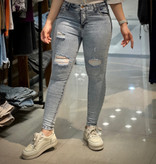 شلوار جین اسکینی زاپ دار زنانه