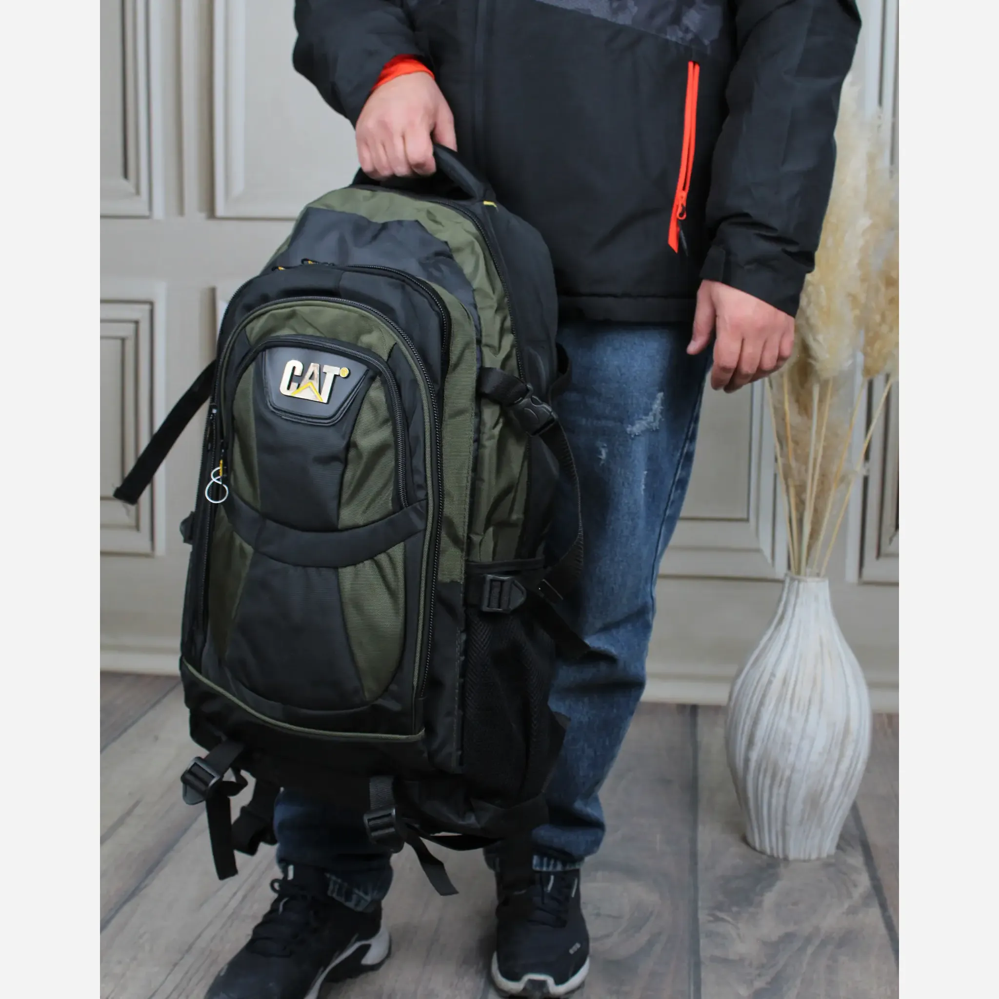 کوله پشتی پارچه ای مسافرتی و ورزشی دارای بند بلند و جیب متعدد ابعاد 55 در 30 در 25 سانتیمتر